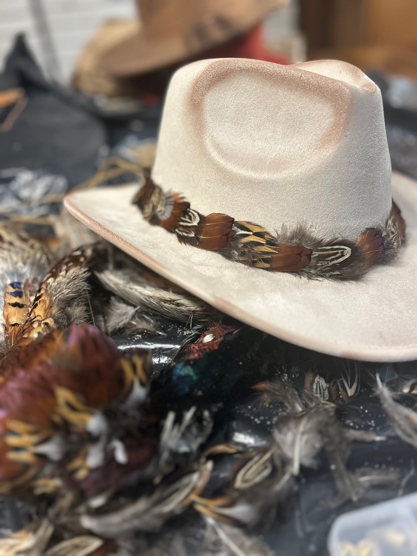 Custom burned pheasant feather cowboy hat